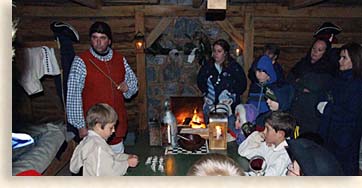 Family gathering around the fireplace