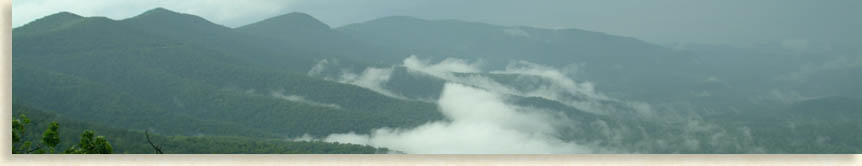 Waves of Blue & Turquoise Mountains in the rain